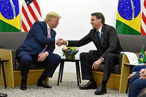 Trump e Bolsonaro conversaram algumas vezes sobre a entrada do Brasil no %u201Cclube dos ricos%u201D -  (crédito: Brendan Smialowski/AFP - 28/6/19)