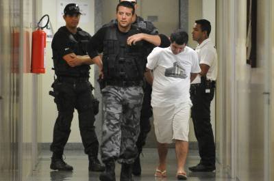 14/05/2013. Crédito: Breno Fortes/CB/D.A Press. Brasil. Brasília - DF. Leonardo Campos Alves, porteiro do prédio onde o casal Villela foi assassinado, chega no Tribunal de Justiça do Distrito Federal e Territórios - TJDFT, para prestar depoimento.