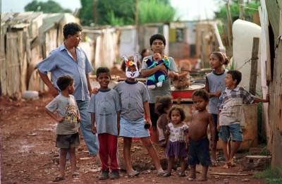 Família na Estrutural clicada por Sergio Amaral