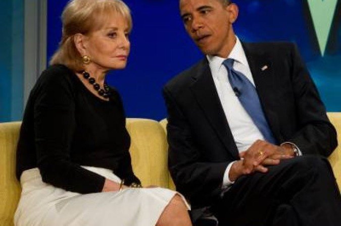 (FILES)US President Barack Obama talks with Barbara Walters as he appears on the ABC daytime television talk show, 