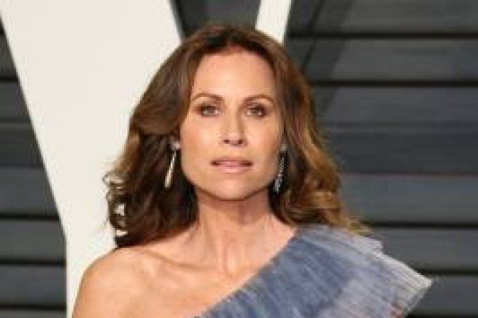 British actress and singer Minnie Driver poses as she arrives to the Vanity Fair Party following the 88th Academy Awards at The Wallis Annenberg Center for the Performing Arts in Beverly Hills, California, on February 26, 2017. / AFP / JEAN-BAPTISTE LACROIX