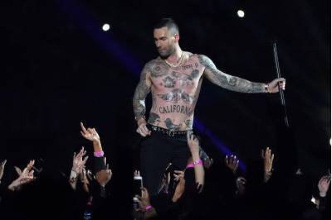 Lead vocalist of Maroon 5 Adam Levine performs during the halftime of Super Bowl LIII between the New England Patriotsthe Los Angeles Rams at Mercedes-Benz Stadium in Atlanta, Georgia, on February 3, 2019. / AFP / TIMOTHY A. CLARY - Lead vocalist of Maroon 5 Adam Levine performs during the halftime of Super Bowl LIII between the New England Patriotsthe Los Angeles Rams at Mercedes-Benz Stadium in Atlanta, Georgia, on February 3, 2019. / AFP / TIMOTHY A. CLARY -