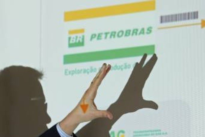 (FILES) In this file photo taken on March 15, 2015 Brazil's Federal Public Ministry prosecutor, Deltan Martinazzo Dallagnol, speaks during a press conference about the Lava Jato operation on the Petrobras corruption scandal, in Curitiba, Brazil. On March 16, 2019 the 