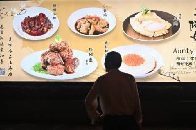 O hábito também deixa a pessoa mais vulnerável ao surgimento de doenças cardíacas e obesidade - (crédito: Hector Retamal/AFP) O hábito também deixa a pessoa mais vulnerável ao surgimento de doenças cardíacas e obesidade - (crédito: Hector Retamal/AFP)