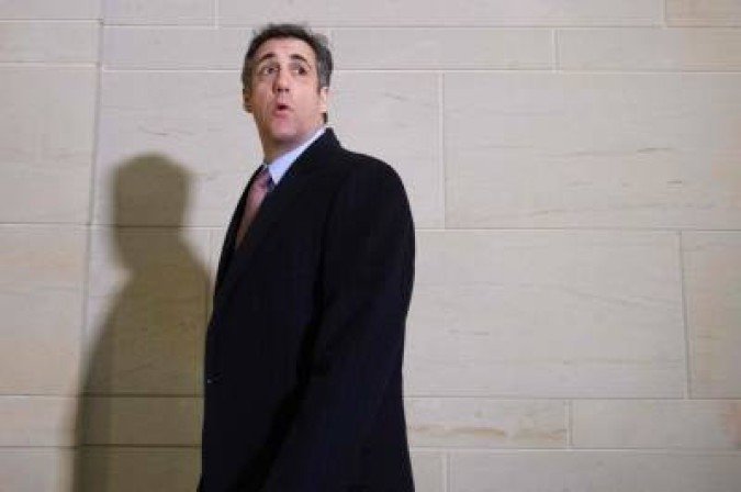 (FILES) In this file photo taken on March 06, 2019 US President Donald Trump's former personal attorney Michael Cohen arrives for private testimony before the US House Intelligence committee on Capitol Hill in Washington, DC. President Donald Trump's former personal attorney Michael Cohen will be released early from prison on May 21, 2020 and is expected to serve out the remainder of his sentence at home as coronavirus continues to spread behind bars, according to a person familiar with the matter. Cohen will be released on furlough while he completes the process of being moved to home confinement, the person said.  / AFP / Jim WATSON