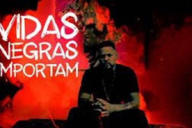 Edi Rock no clipe 'Vidas Negras Importam' - (crédito: Reprodu??o/YouTube) Edi Rock no clipe 'Vidas Negras Importam' - (crédito: Reprodu??o/YouTube)