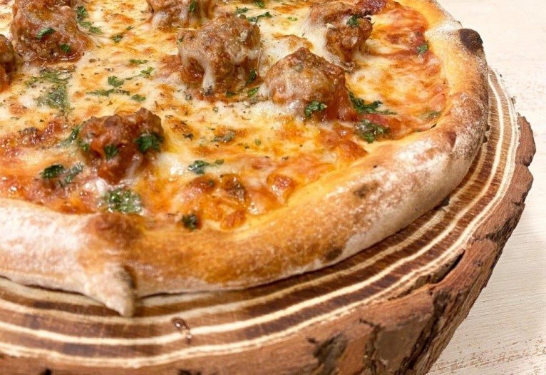  Pizza criada em homenagem ao rapaz.