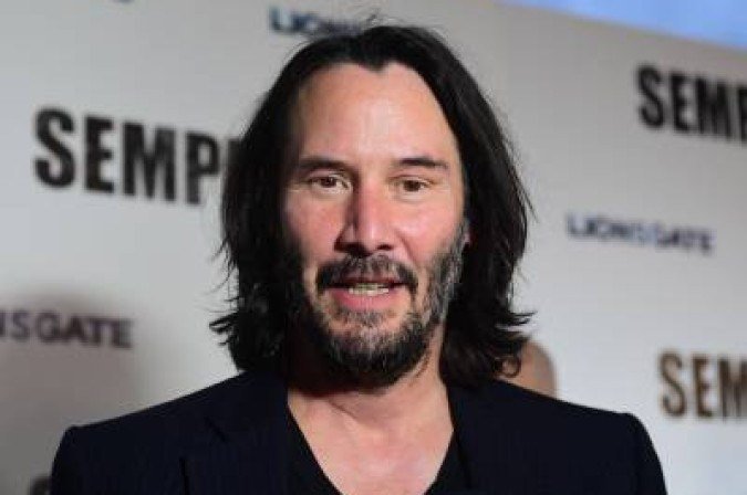 (FILES) In this file photo actor Keanu Reeves arrives for Lionsgate's special screening of 