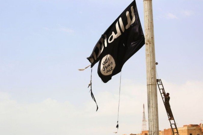 Bandeira do Estado Islâmico - (crédito: Delil Souleiman/AFP) Bandeira do Estado Islâmico - (crédito: Delil Souleiman/AFP)