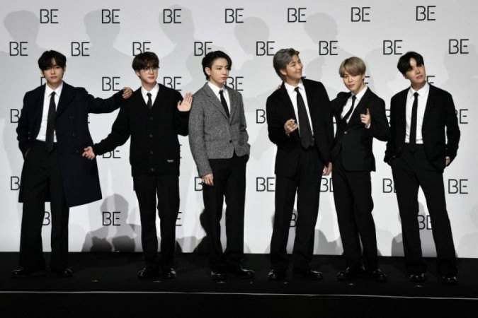 O grupo sul-coreano BTS foi eleito a personalidade do ano no entretenimento pela revista americana Time nesta quinta-feira (10/12) - (crédito: Jung Yeon-je/AFP) O grupo sul-coreano BTS foi eleito a personalidade do ano no entretenimento pela revista americana Time nesta quinta-feira (10/12) - (crédito: Jung Yeon-je/AFP)