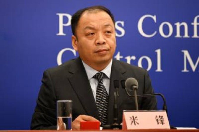 Mi Feng, a spokesman for the National Health Commission, attends a press conference of the t Prevention and Control Mechanism of the State Council in Beijing on December 21, 2020. / AFP / WANG Zhao - (crédito: WANG ZHAO) Mi Feng, a spokesman for the National Health Commission, attends a press conference of the t Prevention and Control Mechanism of the State Council in Beijing on December 21, 2020. / AFP / WANG Zhao - (crédito: WANG ZHAO)