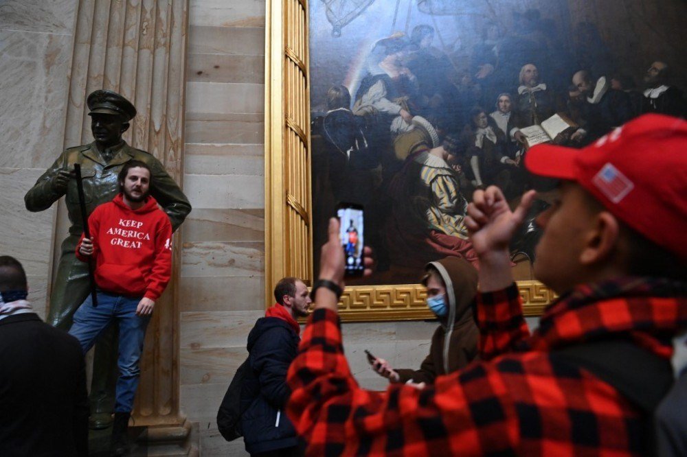 Supporters of US President Donald Trump enter the US Capitol's Rotunda on January 6, 2021, in Washington, DC. Demonstrators breeched security and entered the Capitol as Congress debated the a 2020 presidential election Electoral Vote Certification.
Saul LOEB / AFP