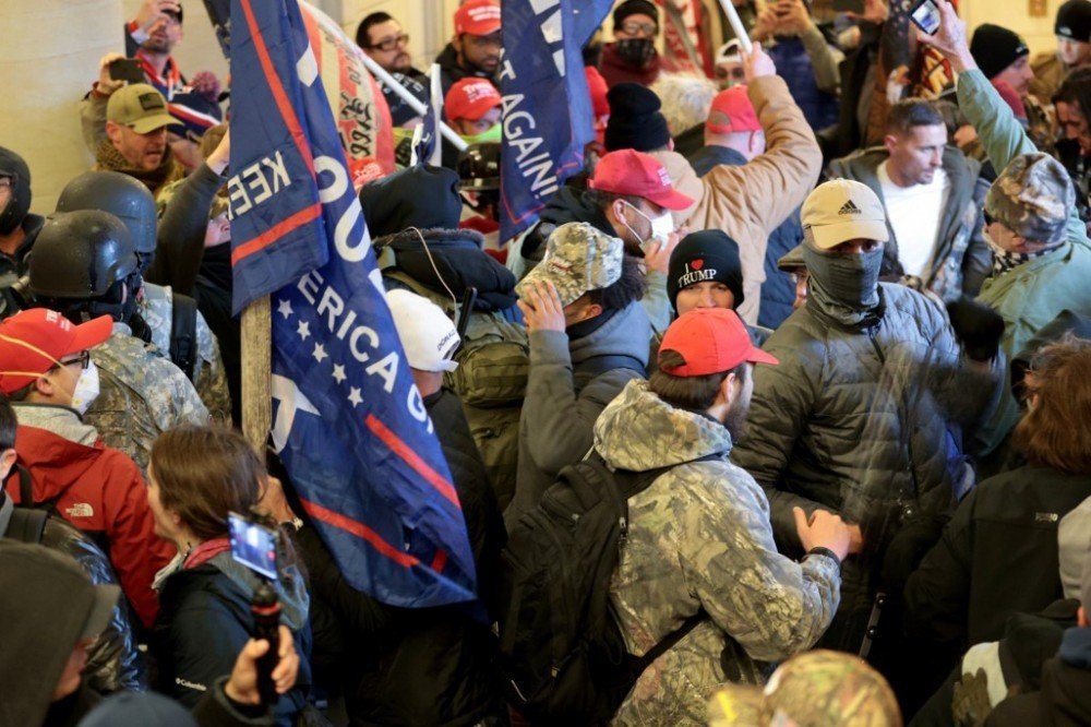 WASHINGTON, DC - JANUARY 06: Protesters gather inside the U.S. Capitol Building on January 06, 2021 in Washington, DC. Congress held a joint session today to ratify President-elect Joe Biden's 306-232 Electoral College win over President Donald Trump. A group of Republican senators said they would reject the Electoral College votes of several states unless Congress appointed a commission to audit the election results. Win McNamee/Getty Images/AFP 
WIN MCNAMEE / GETTY IMAGES NORTH AMERICA / Getty Images via AFP