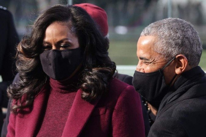 O casal Michelle e Barack Obama assiste à cerimônia
