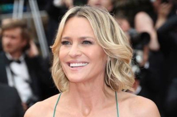 (FILES) In this file photo US actress Robin Wright poses as she arrives on May 18, 2017 for the screening of the film 'Loveless' (Nelyubov) at the 70th edition of the Cannes Film Festival in Cannes, southern France.  US actress Robin Wright always wanted to direct, but it wasn't until Netflix's 