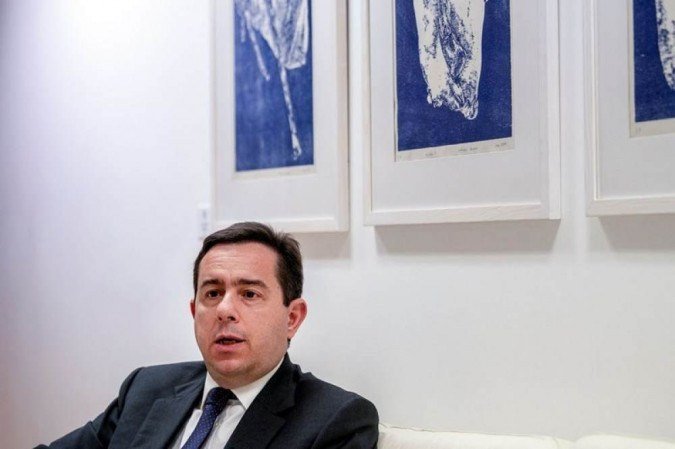 Ministro grego das Migrações, Notis Mitarachi -  (crédito: AFP / Angelos Tzortzinis)