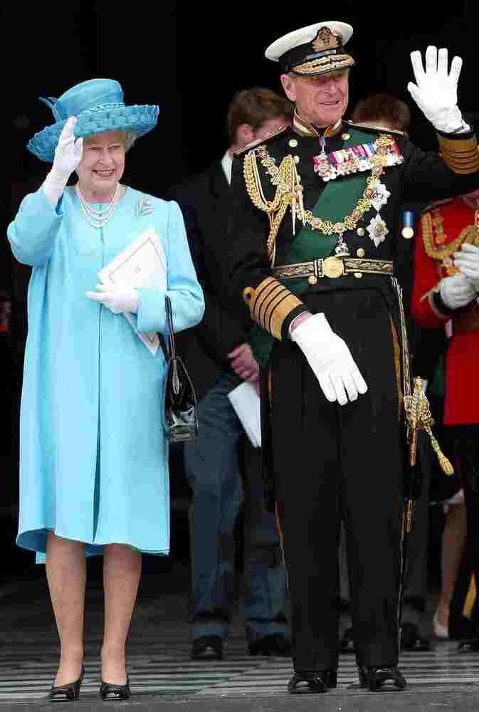 ** FILE ** Britain's Queen Elizabeth II, accompanied by her husband Prince Philip,  leaves St Paul's Cathedral in London, in this June 4, 2002 file photo, following a service of thanksgiving to celebrate her Golden Jubilee. The queen underwent a successful operation on Monday, Jan. 13, 2003 to remove a torn cartilage from her right knee, Buckingham Palace said.(AP Photo/Stephen Hird, File)