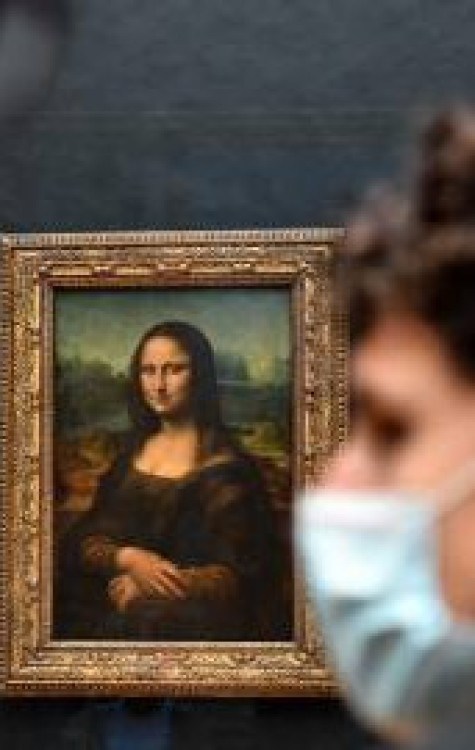 A obra-prima do artista italiano Leonardo da Vinci, também conhecida como Mona Lisa, exibida no Museu do Louvre -  (crédito: ALAIN JOCARD)