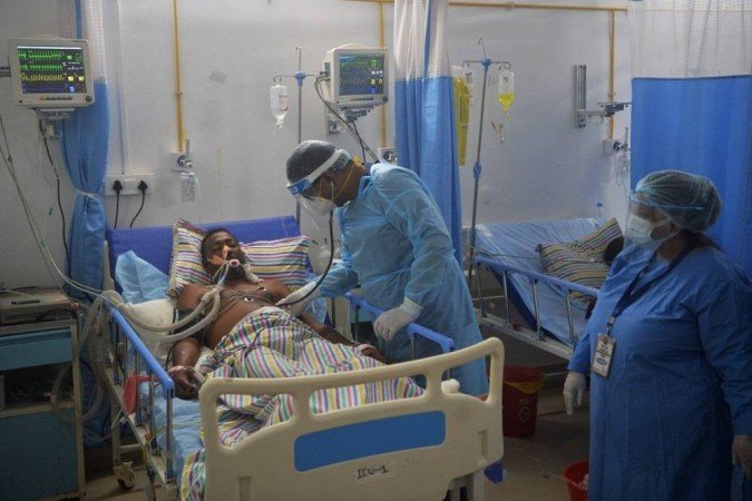 Entre 10% e 33% dos pacientes que tiveram covid-19 podem desenvolver sequelas - (crédito: DIPTENDU DUTTA/AFP) Entre 10% e 33% dos pacientes que tiveram covid-19 podem desenvolver sequelas - (crédito: DIPTENDU DUTTA/AFP)
