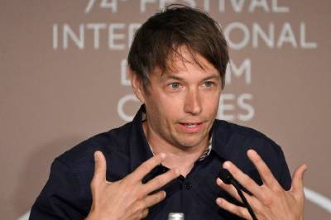 Us director Sean Baker speaks during a press conference for the film 
