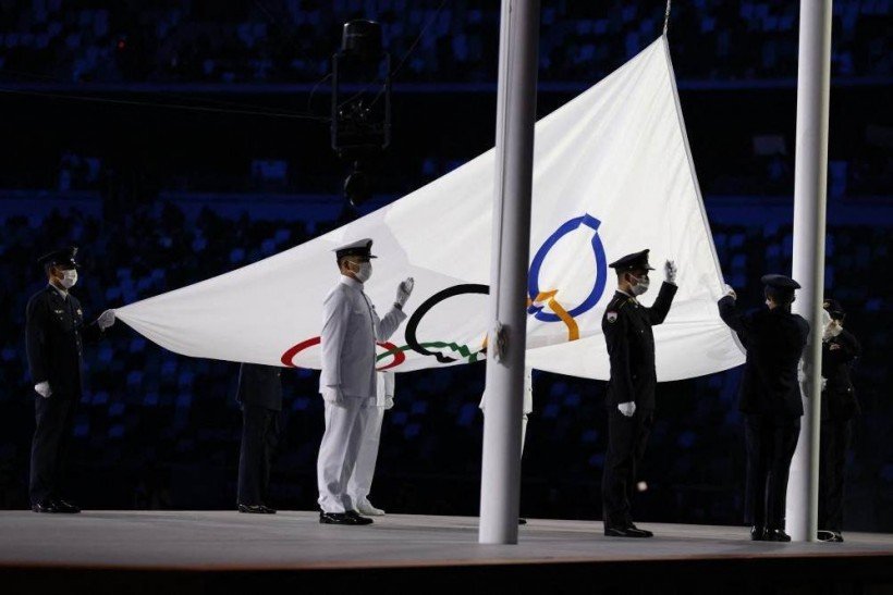 Officers of Japan's Self-Defense Forces raise the Olympic flag during the opening ceremony of the Tokyo 2020 Olympic Games, at the Olympic Stadium, in Tokyo, on July 23, 2021.
Odd ANDERSEN / AFP