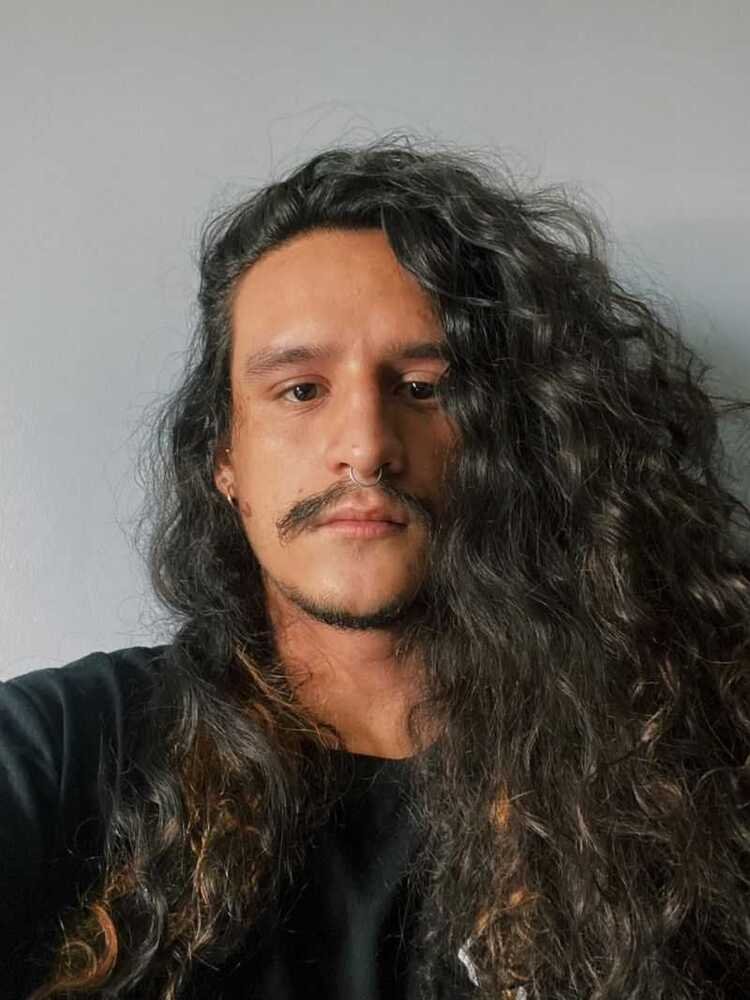 João Marcello Marques voltou ao serviço presencial mesmo sem estar vacinado.