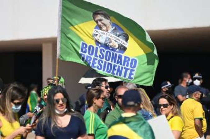 Demonstrators take part in a rally in support of Brazilian President Jair Bolsonaro and calling for a printed vote model at Esplanade of Ministries in Brasilia, Brazil on August 1, 2021. (Photo by EVARISTO SA / AFP)
