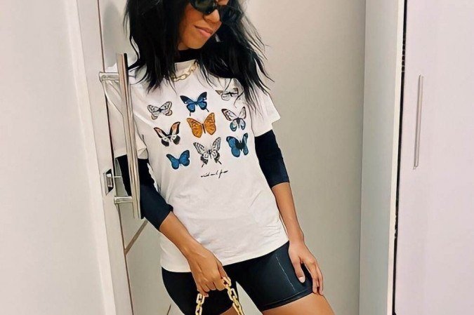 A universitária Bruna Brito apostou no short biker e numa t-shirt estampada para compor o seu look