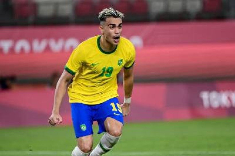Brazil's midfielder Reinier celebrates after scoring a penalty during the Tokyo 2020 Olympic Games men's semi-final football match between Mexico and Brazil at Ibaraki Kashima Stadium in Kashima city, Ibaraki prefecture on August 3, 2021. (Photo by PEDRO PARDO / AFP)
