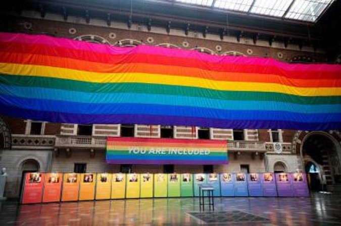 A giant rainbow flag - a 30-metre section of a Rainbow Flag created by Gilbert Baker in commemoration for the Stonewall uprising - is being raised at Copenhagen City Hall on August 11, 2021, as preparations are under way for the Copenhagen 2021 WorldPride and EuroGames. According to the organisers, the 