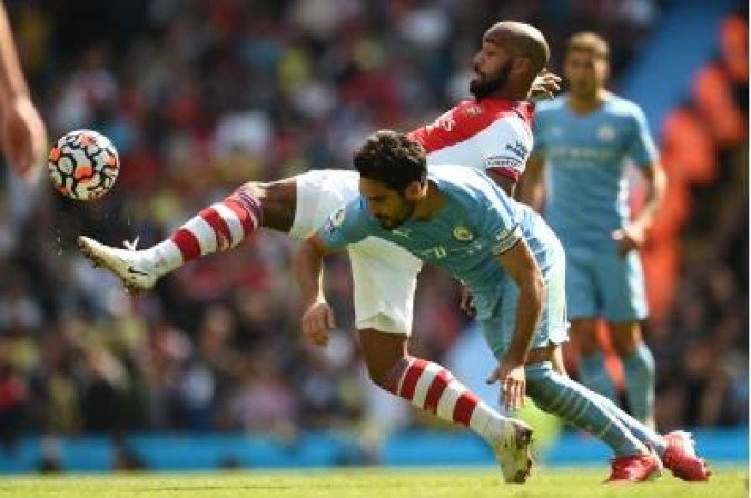 Lacazette atuando pelo Arsenal contra o Manchester city - (crédito: OLI SCARFF ) Lacazette atuando pelo Arsenal contra o Manchester city - (crédito: OLI SCARFF )