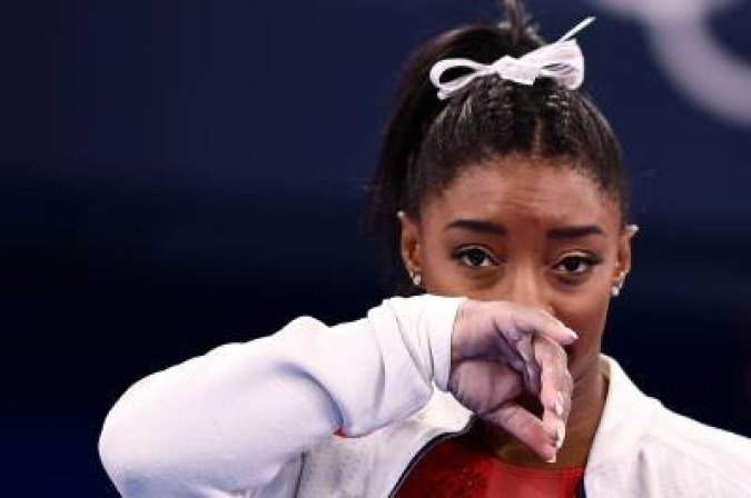 Desistência de Simone Biles fez mundo discutir sobre saúde mental de atletas - (crédito: LOIC VENANCE) Desistência de Simone Biles fez mundo discutir sobre saúde mental de atletas - (crédito: LOIC VENANCE)