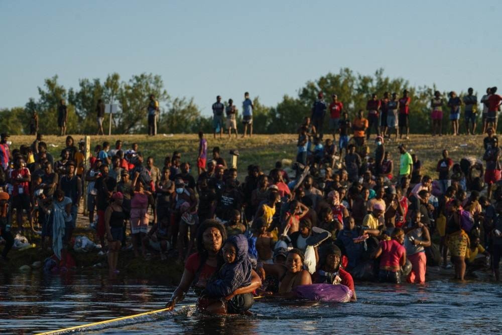 Expulsos do Texas, haitianos lutam contra a raiva e a angústia em seu retorno