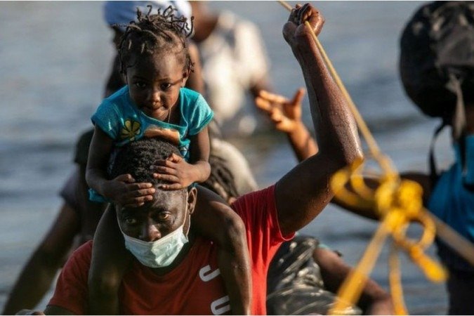 Crédito: Getty Images. 
Haitianos dizem não querer voltar a seu país - 