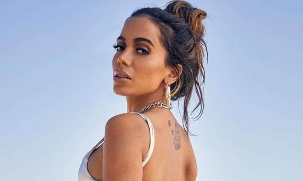 QG da Anitta on X: Confira a letra e a tradução de FAKINGLOVE   / X