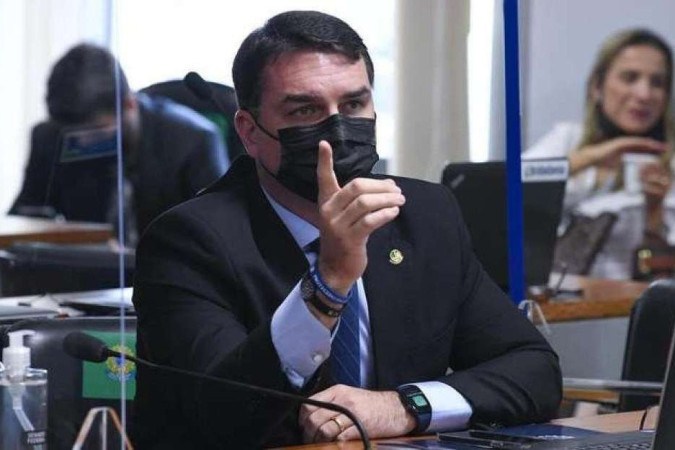 Senador Flávio Bolsonaro durante sessão de leitura do relatório da I da covid - (crédito: Roque de Sá/Agência Senado) Senador Flávio Bolsonaro durante sessão de leitura do relatório da I da covid - (crédito: Roque de Sá/Agência Senado)