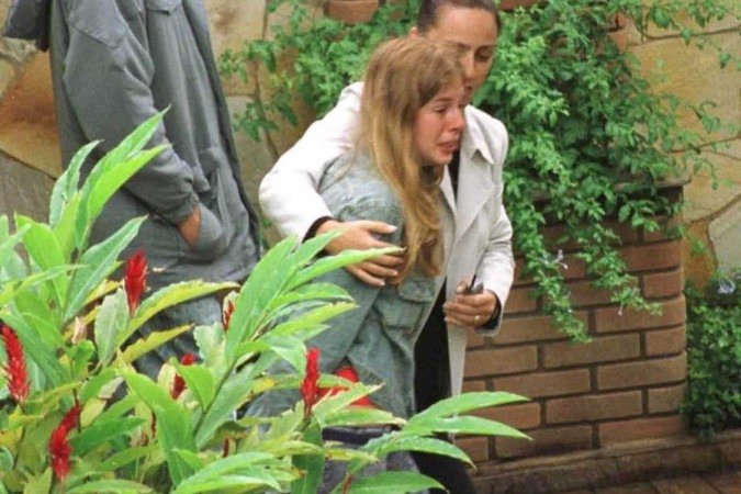  Brasil. Sao Paulo - SP. Pauta: Caso Von Richthofen. Reconstituicao. Estudante Suzane Richthofen Sao Paulo, 13/11/2002. Foto: Fernando Pereira/Diario de SP/Agencia O Globo. Caso Von Richthofen. Reconstituicao. Estudante Suzane Richthofen, 19,  chega a casa da familia, no bairro do Brooklin para participar da reconstituicao do assassinato dos pais dela, Marisia e Manfred Von Richthofen.14 nov. 2002. Capa.4 dez. 2002. Ultimas, p. 3.8 dez. 2002. Brasil, p. 18.19 abr. 2003. Brasil, p. 10.17 abr. 2005. Cidades, p. 30.11 abr. 2006. Brasil, p. 11.
      Caption 