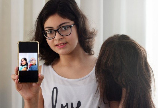 A estudante Isadora Lira, 12, voltou a sorrir com o novo cabelo que veio de voluntários - (crédito: ED ALVES/CB/D.A.Press) A estudante Isadora Lira, 12, voltou a sorrir com o novo cabelo que veio de voluntários - (crédito: ED ALVES/CB/D.A.Press)