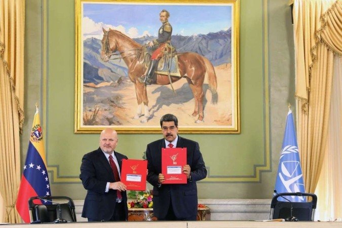 Nicolás Maduro (D) e o procurador do TPI, Karim Khan, em Caracas - (crédito: Palácio de Miraflores/AFP) Nicolás Maduro (D) e o procurador do TPI, Karim Khan, em Caracas - (crédito: Palácio de Miraflores/AFP)