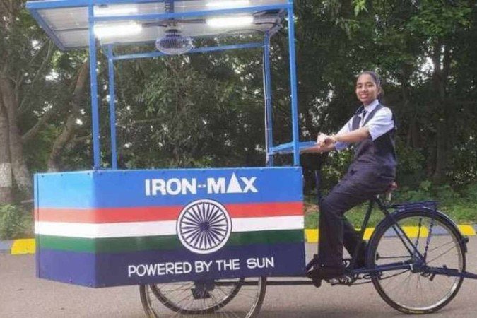 Vinisha teve a ideia de fazer a bicicleta com ferro de passar embutido que se sustenta por energia solar, 100% renovável e limpa - (crédito: Reprodução/Instagram) Vinisha teve a ideia de fazer a bicicleta com ferro de passar embutido que se sustenta por energia solar, 100% renovável e limpa - (crédito: Reprodução/Instagram)