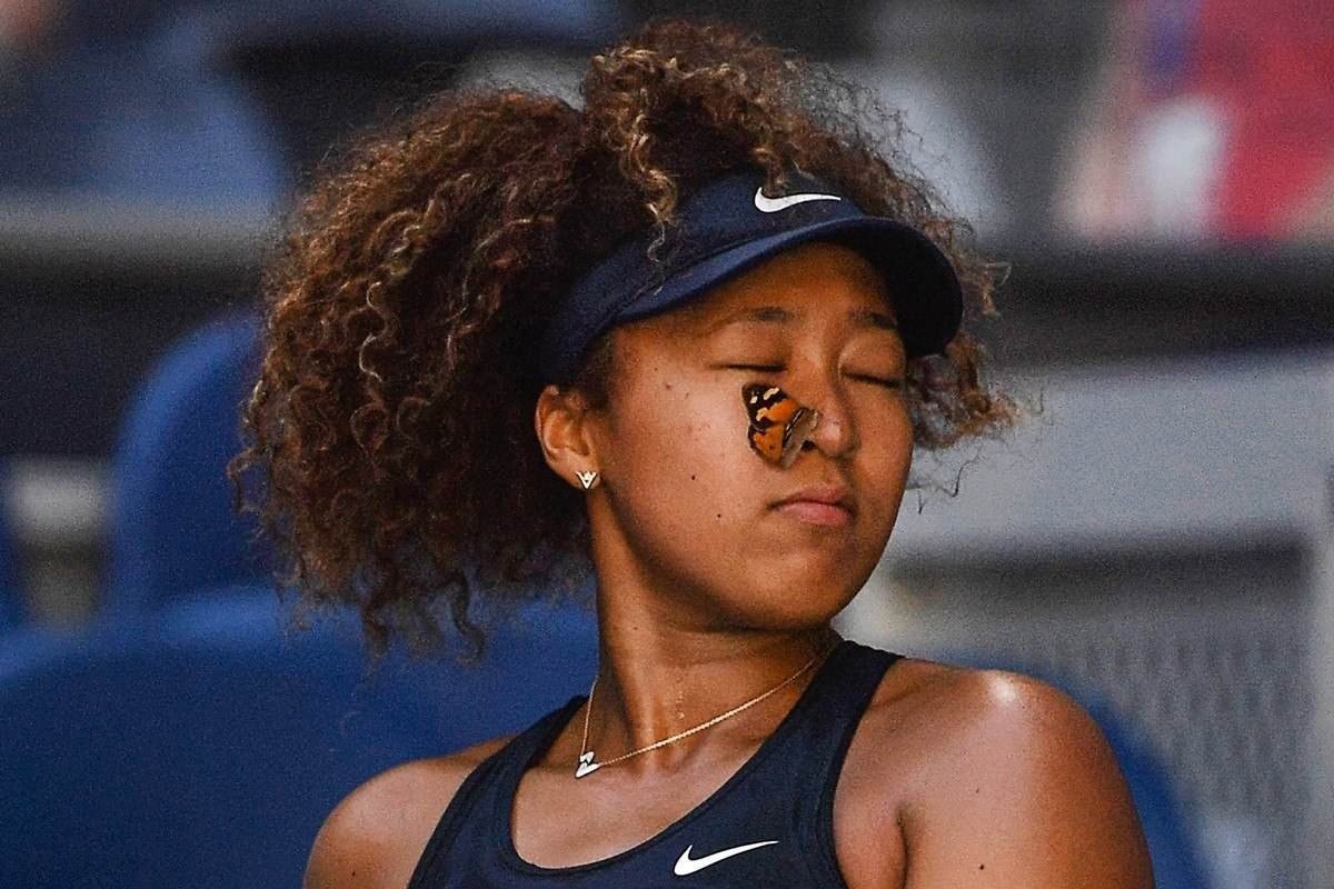 Fevereiro: uma borboleta no rosto da tenista Naomi Osaka durante a final do Australian Open Tennis, na Austrália 