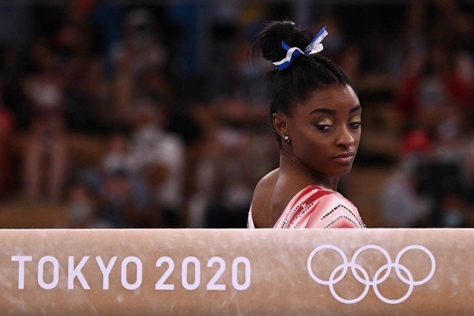 Agosto: Simone Biles se tornou a atleta do ano ao desistir da final da Olimpíada de Tóquio - (crédito: Lionel BONAVENTURE / AFP) Agosto: Simone Biles se tornou a atleta do ano ao desistir da final da Olimpíada de Tóquio - (crédito: Lionel BONAVENTURE / AFP)
