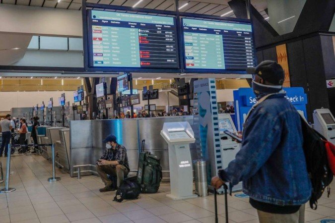 Uma enxurrada de países ao redor do mundo proibiu voos do sul da África após a descoberta da variante, incluindo - (crédito: Phill Magakoe/AFP) Uma enxurrada de países ao redor do mundo proibiu voos do sul da África após a descoberta da variante, incluindo - (crédito: Phill Magakoe/AFP)