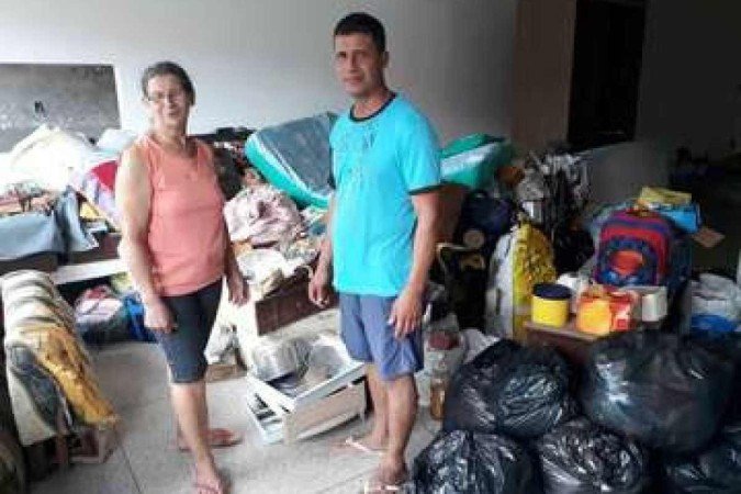 Sem perder a fé, a aposentada Giselda Marta, com o filho, Eliezer Eduardo, foi acolhida numa igreja evangélica de Santa Luzia - (crédito: Gustavo Werneck/EM/D.A Press) Sem perder a fé, a aposentada Giselda Marta, com o filho, Eliezer Eduardo, foi acolhida numa igreja evangélica de Santa Luzia - (crédito: Gustavo Werneck/EM/D.A Press)