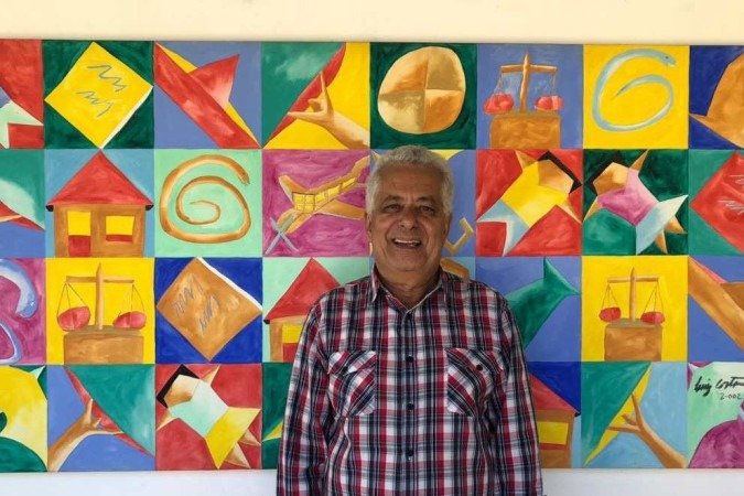 O artista plástico Luiz Costa e sua obra Alegria de Pintar,
painel de 2mx10, no STF