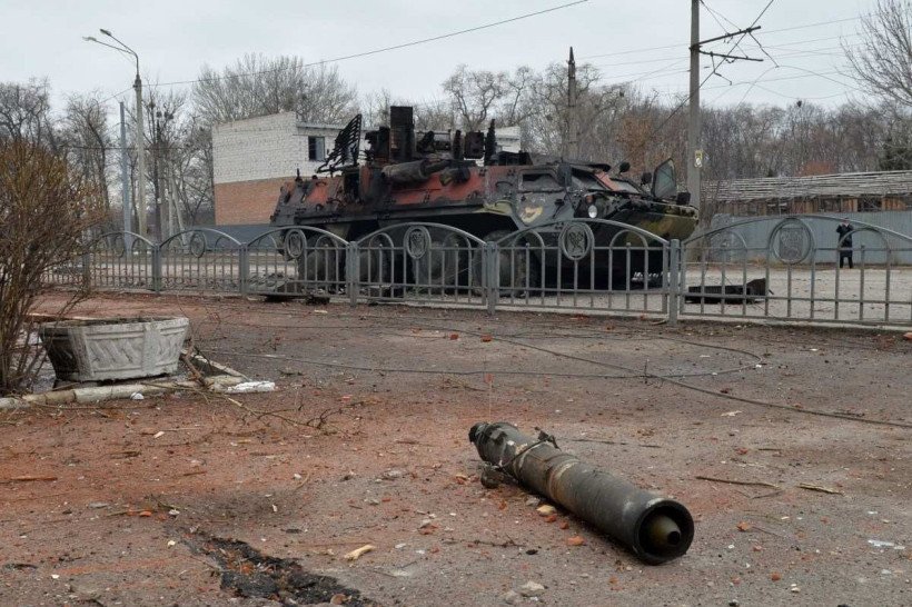  This photograph shows an Ukrainian armoured personnel carrier (APC) BTR-4 destroyed as a result of fight not far from the centre of Ukrainian city of Kharkiv, located some 50 km from Ukrainian-Russian border, on February 28, 2022. (Photo by Sergey BOBOK / AFP)
      