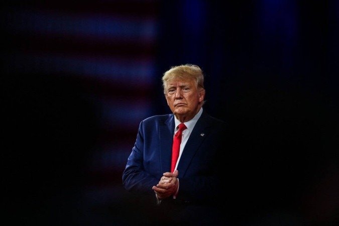 Trump multado com US$ 10.000 por dia até que coopere com investigação - (crédito: CHANDAN KHANNA / AFP) Trump multado com US$ 10.000 por dia até que coopere com investigação - (crédito: CHANDAN KHANNA / AFP)