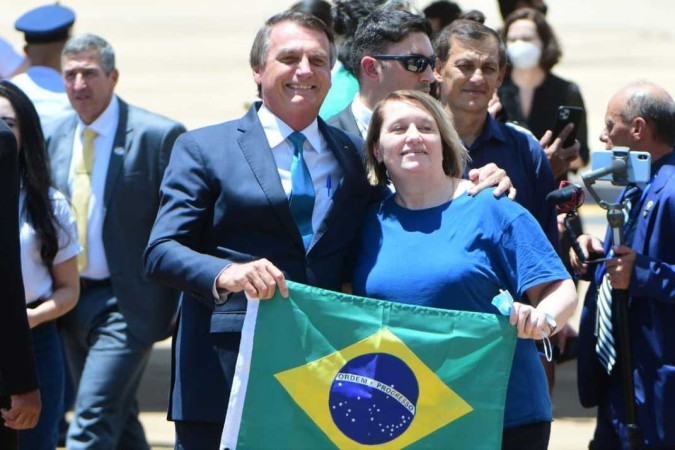 Bolsonaro recebe resgatados da Ucrânia: entregas do governo -  (crédito: ED ALVES/CB/DA.PRESS)