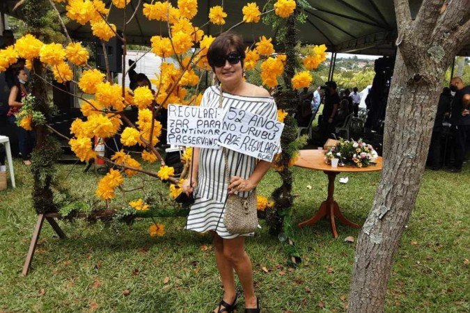 Isabel Pereira no evento de assinatura do termo de regulariza&ccedil;&atilde;o