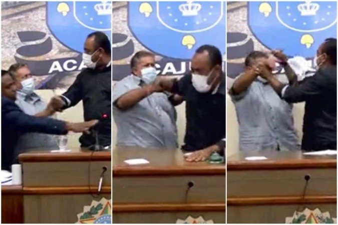 Os vereadores José Edson e Silvio dos Santos partiram pra cima do presidente da Câmara de Acajutiba (BA), após ele se recusar a parar o processo de eleição da Mesa Diretora, acusado de ser irregular pelos parlamentares - (crédito: CMA/Reprodução) Os vereadores José Edson e Silvio dos Santos partiram pra cima do presidente da Câmara de Acajutiba (BA), após ele se recusar a parar o processo de eleição da Mesa Diretora, acusado de ser irregular pelos parlamentares - (crédito: CMA/Reprodução)